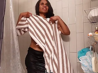 Essential Indian maid cleans the toilet and shower