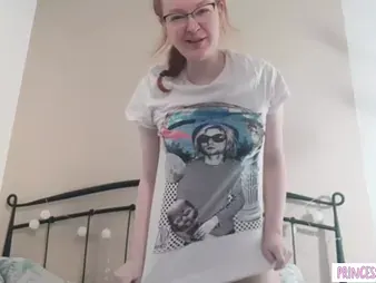 Witness this bashful sandy-haired teen with glasses drop while showcasing off her wet vagina