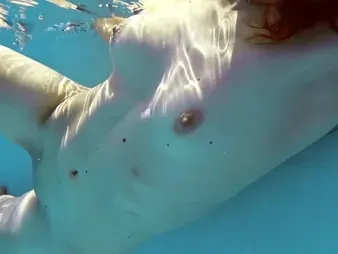 Curly-haired nubile with grounds backside and baps swims like a professional in the pool, gets damp and ultra-kinky!