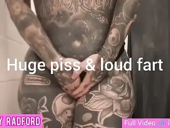 Melody Radford's inked physique gets sloppy in piss and farts like a professional