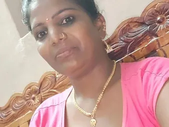 Check overseas this Tamil photograph featuring a warm old lady